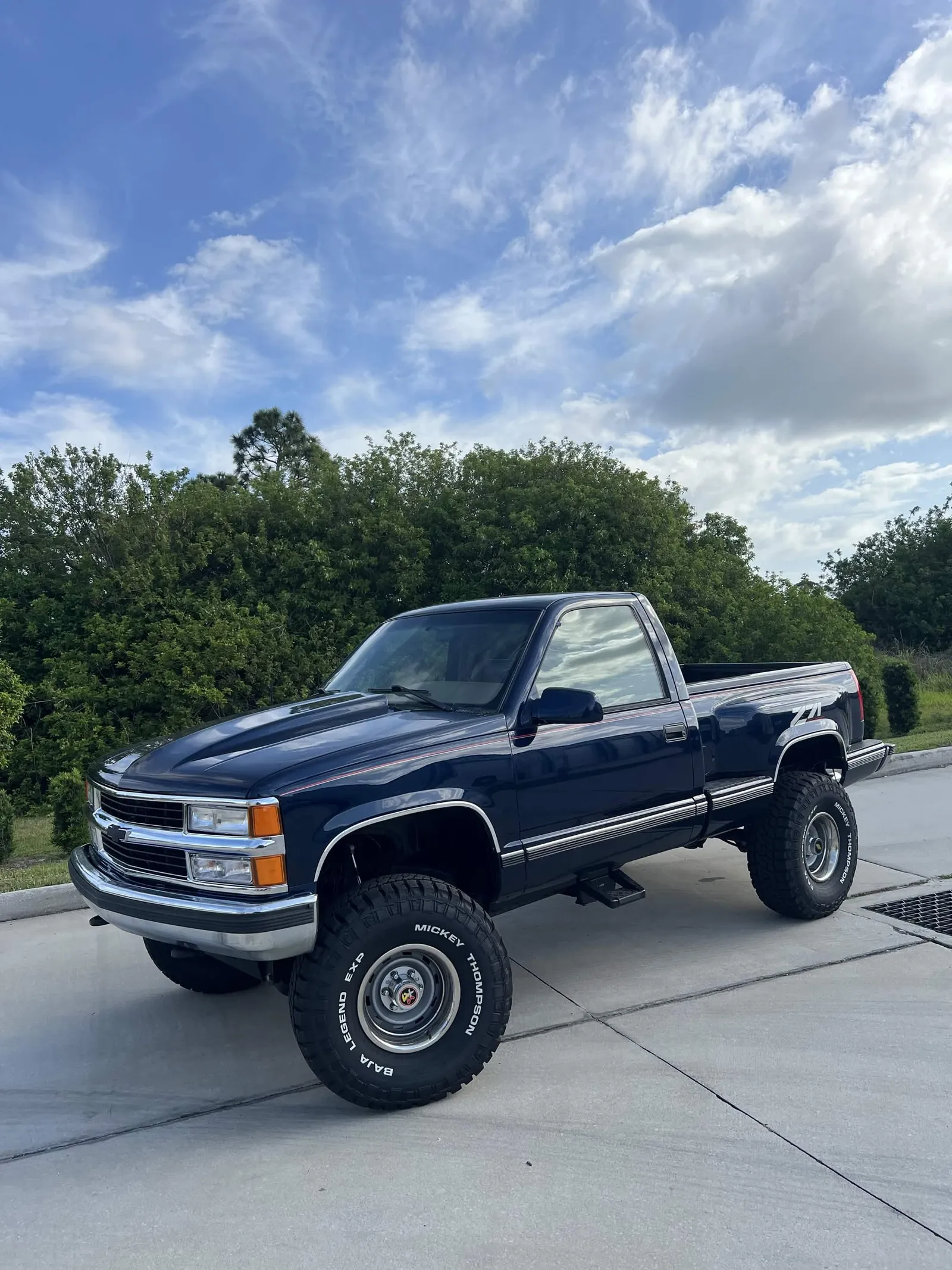 1995 Chevrolet K1500 Silverado Indigo Blue Lifted 4x4 for sale at Shane's Garage | Specialty Cars of Florida