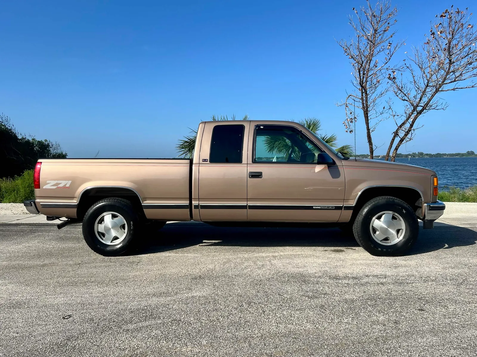 1997 GMC K1500 Light Autumn Wood Z71 4x4 for sale at Shane's Garage | Specialty Cars of Florida